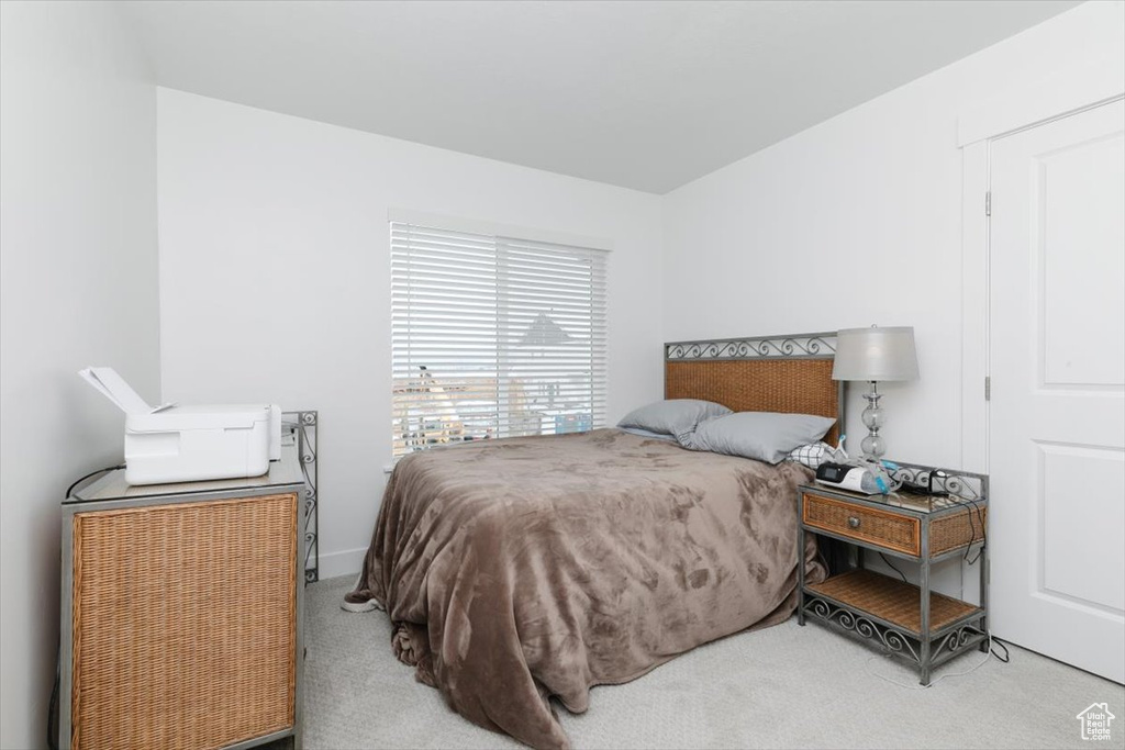 Bedroom with carpet flooring