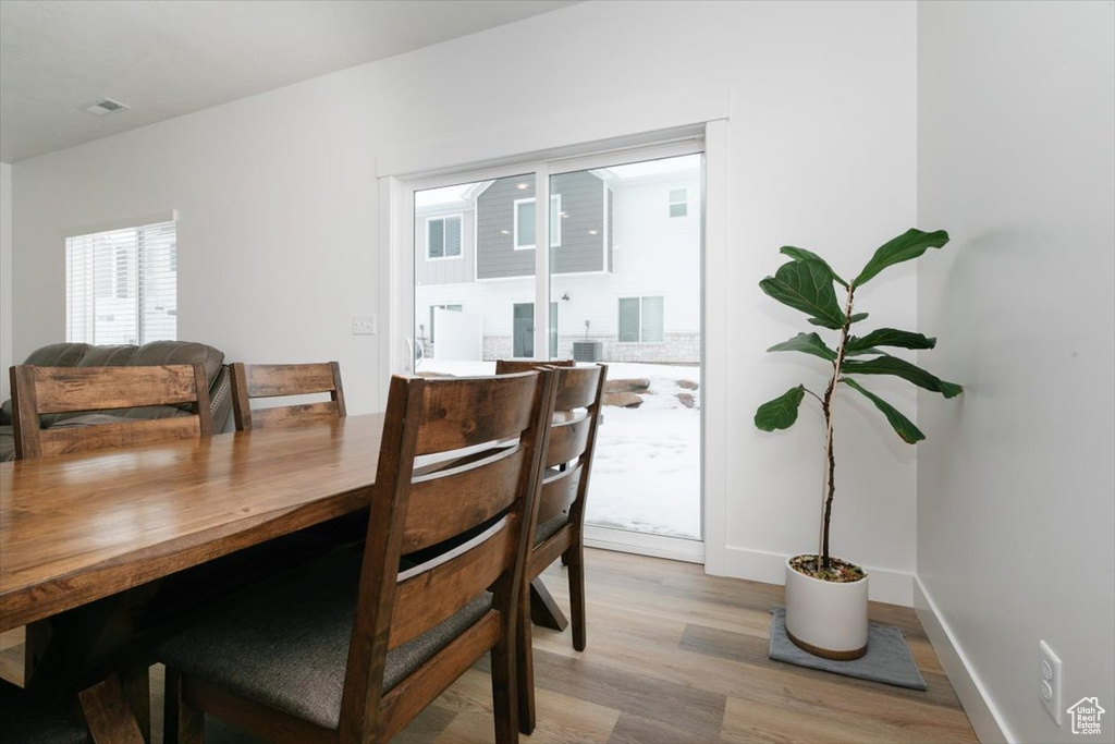 Dining space featuring light hardwood / wood-style flooring