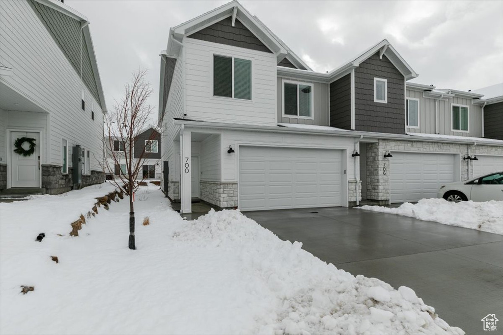 View of front of home with a garage