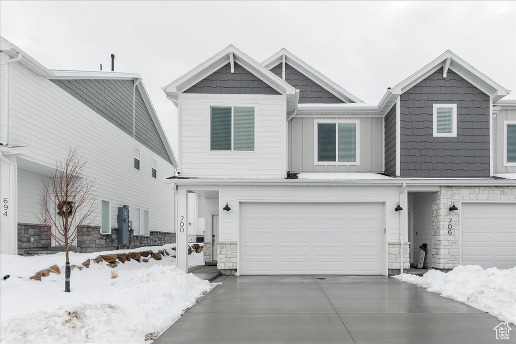 View of front of home featuring a garage