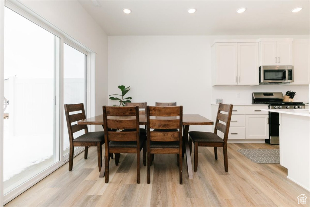 Dining space featuring light hardwood / wood-style floors