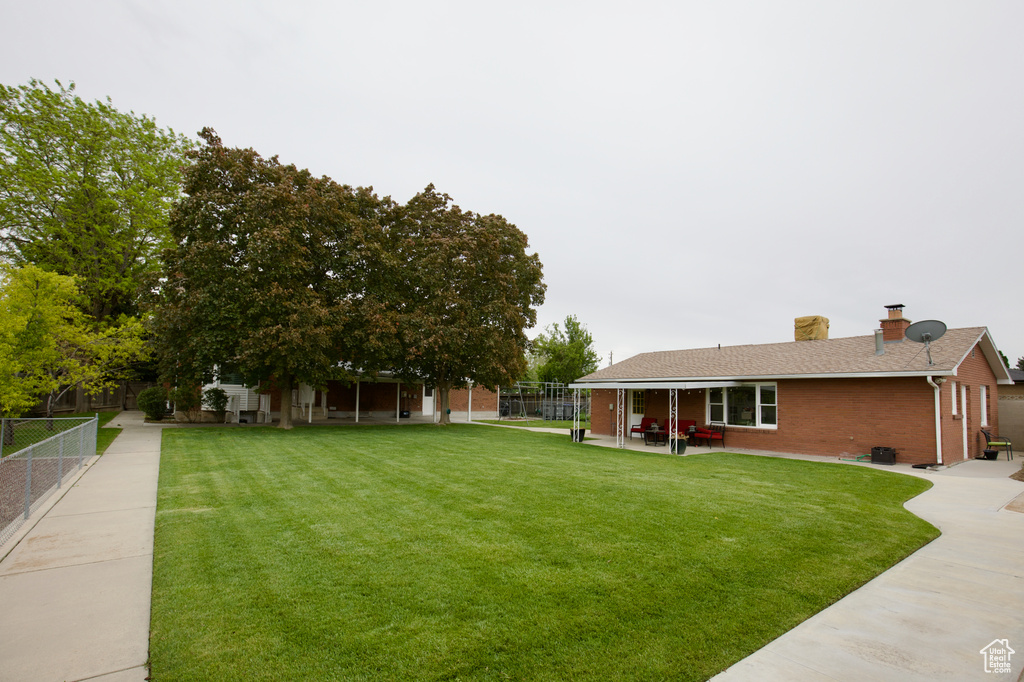 View of yard featuring a patio area