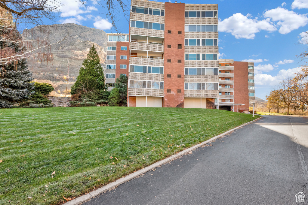 View of apartment building / complex with a mountain view