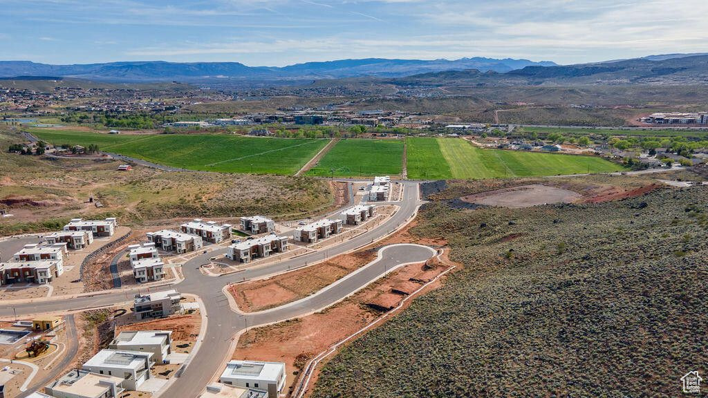 Birds eye view of property featuring a mountain view