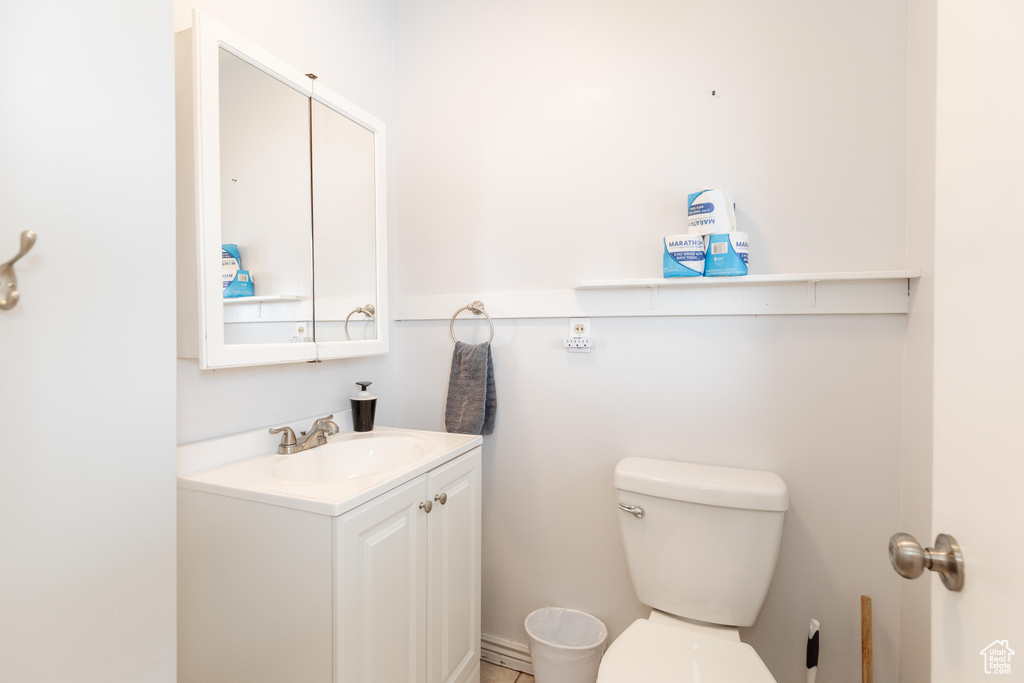 Bathroom with vanity and toilet