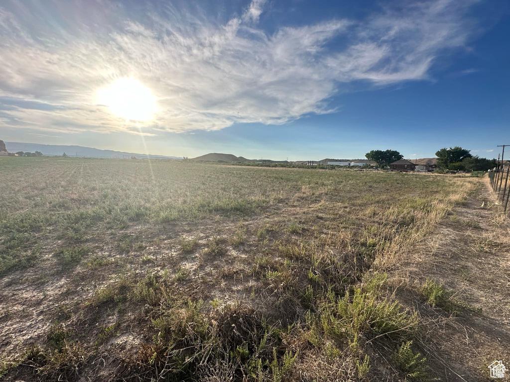 Exterior space with a rural view and a mountain view