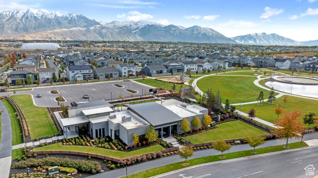 Drone / aerial view with a residential view and a mountain view