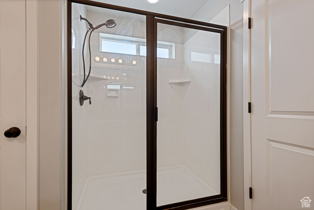 Interior details with a shower stall