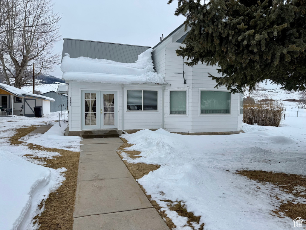 View of front of house featuring french doors