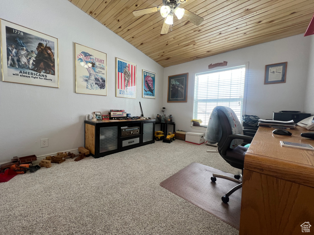 Home office featuring carpet floors, wood ceiling, vaulted ceiling, and ceiling fan