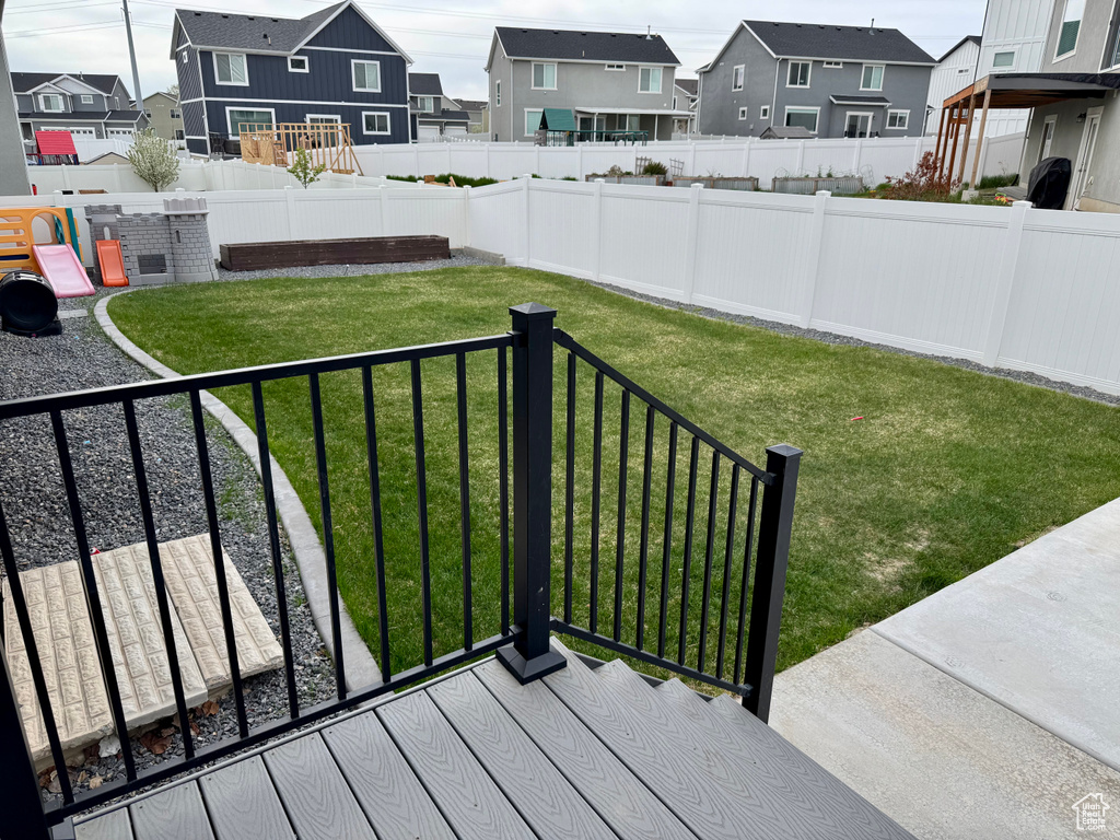 View of yard featuring a residential view and a fenced backyard