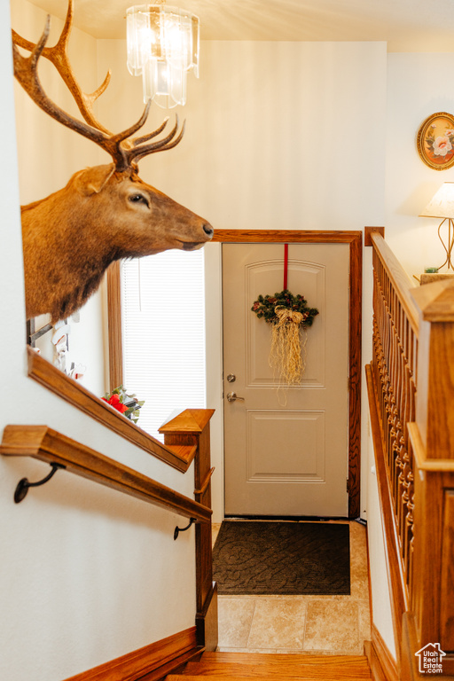Entrance foyer featuring an inviting chandelier
