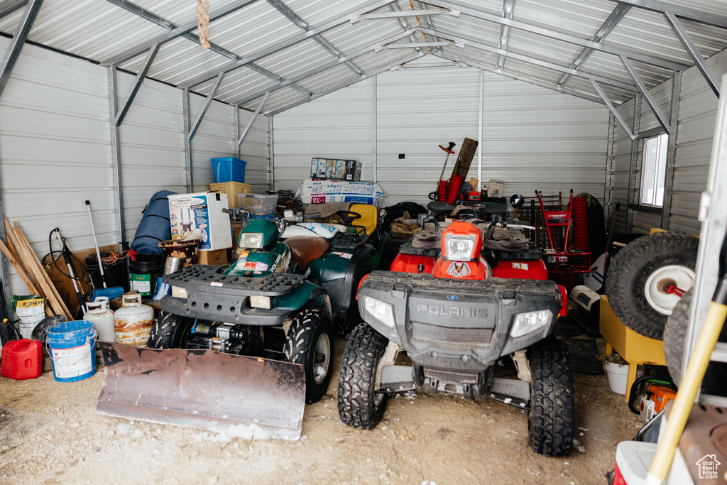 Garage featuring metal wall
