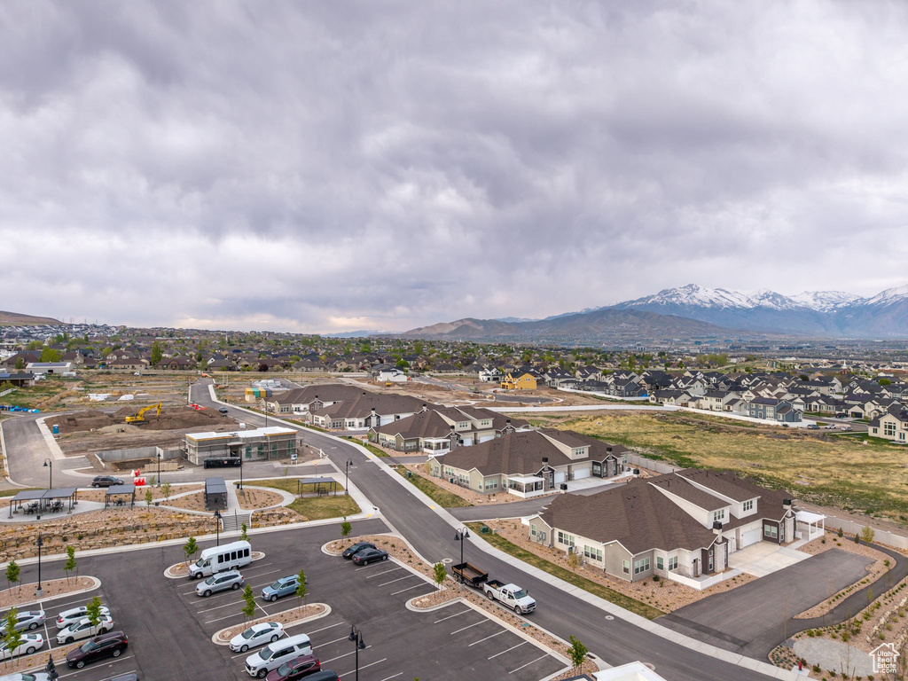 Aerial view of residential area featuring mountains