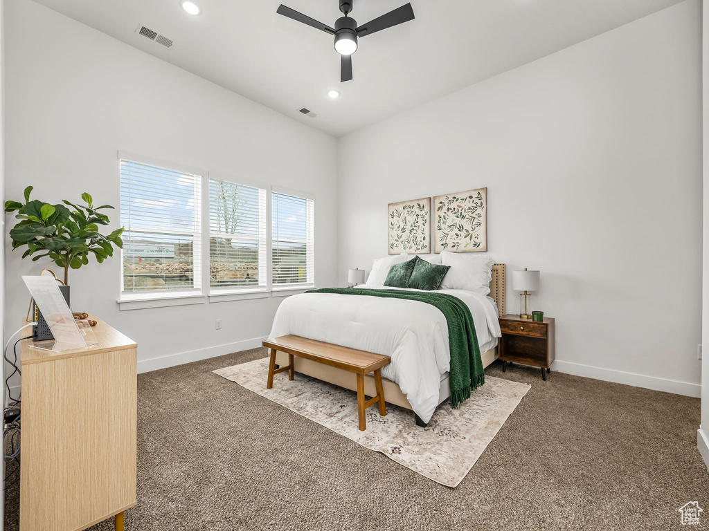 Bedroom with carpet floors, baseboards, recessed lighting, and a ceiling fan