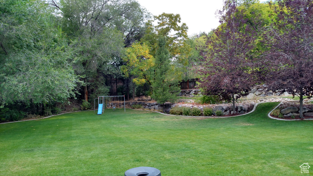 View of yard with a playground