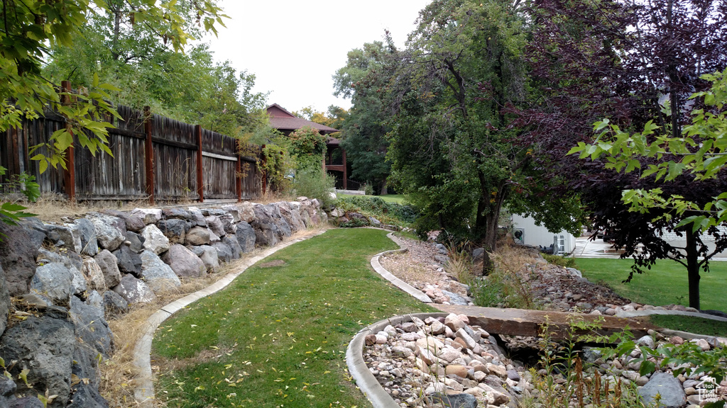 View of yard with fence