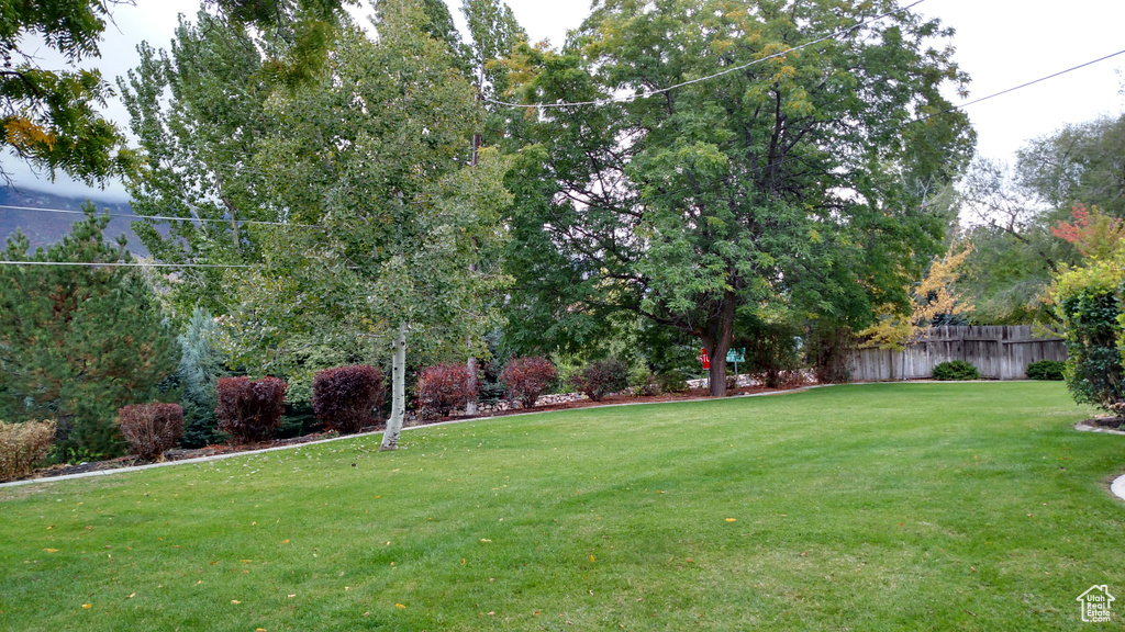 View of yard with fence