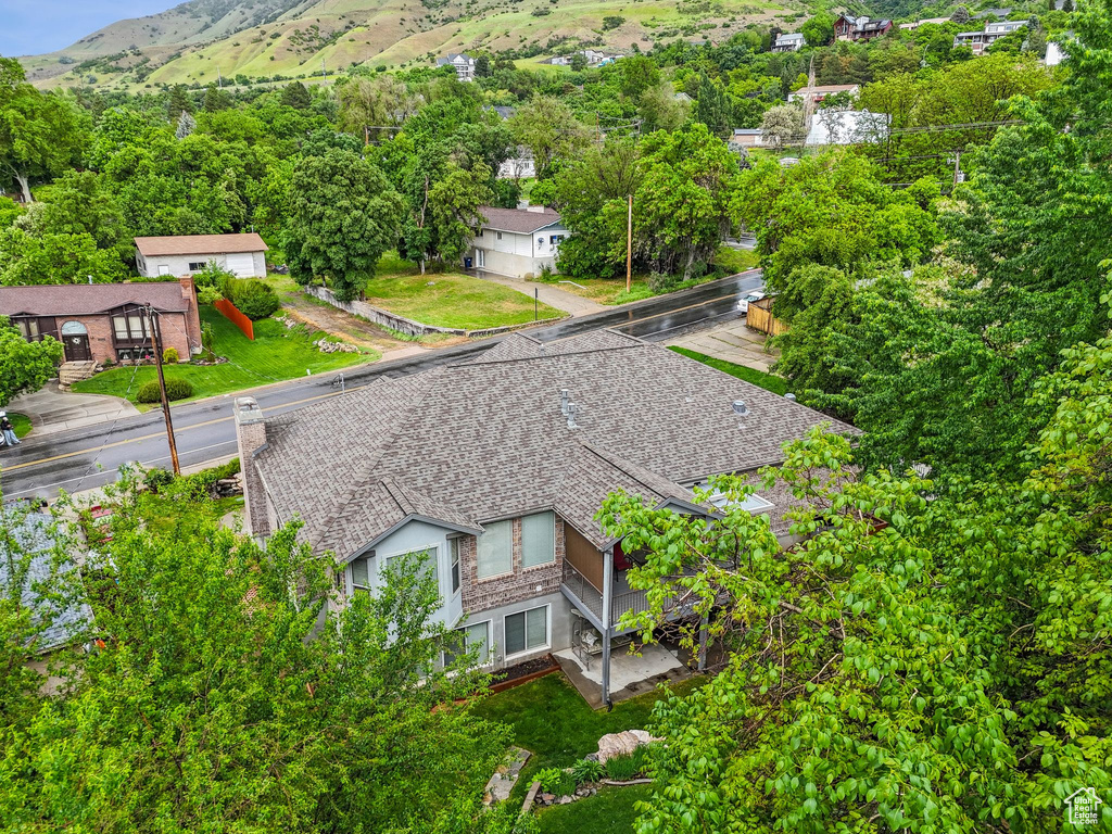 View from above of property featuring a mountainous background