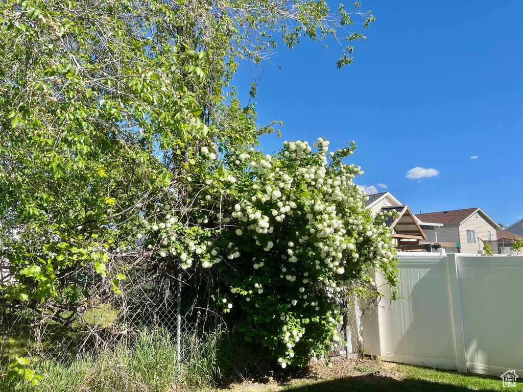View of side of property with fence