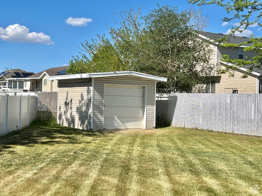 Detached garage with a shed