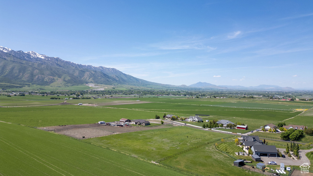 View of mountain backdrop featuring rural landscape