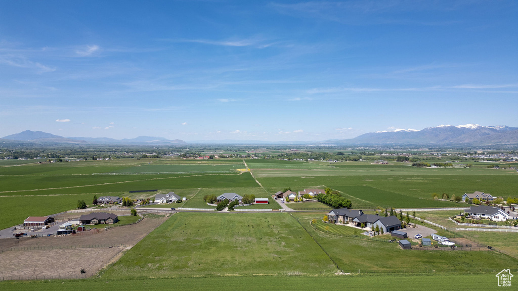Overview of rural landscape with a mountain backdrop