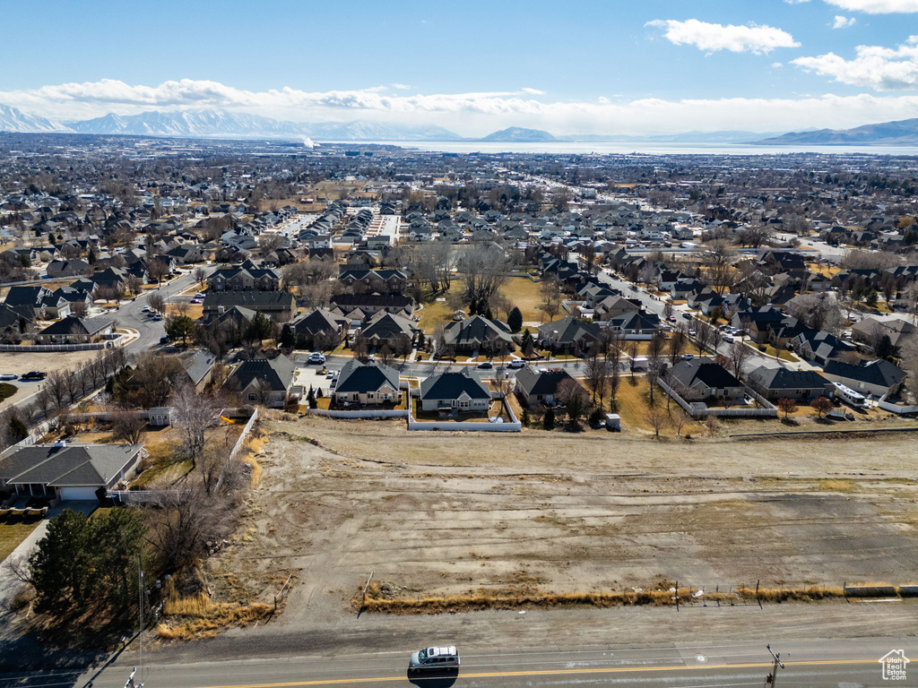 Drone / aerial view with a residential view and a mountain view