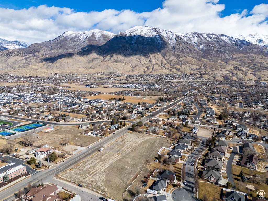 Birds eye view of property with a residential view and a mountain view