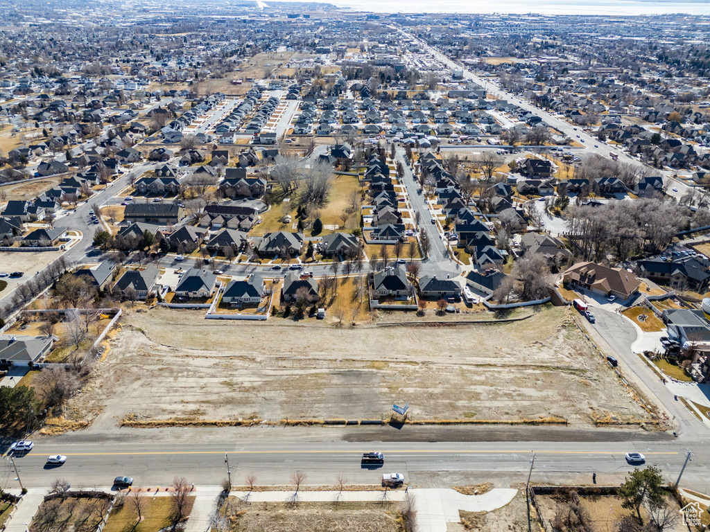 Birds eye view of property with a residential view