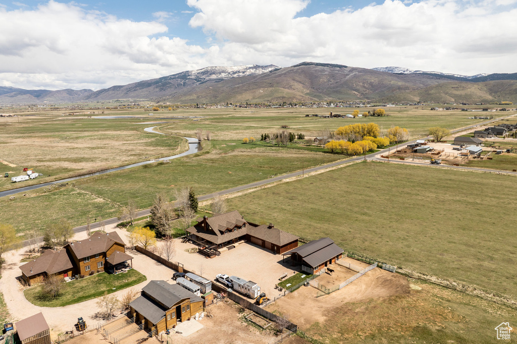 Birds eye view of property featuring a rural view and a mountain view