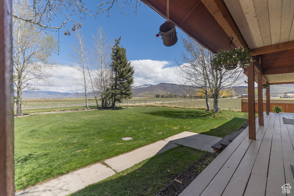 View of yard featuring a mountain view and a rural view