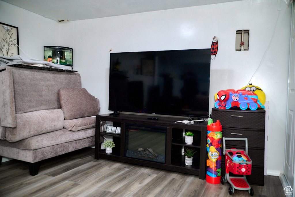 Living area with wood finished floors
