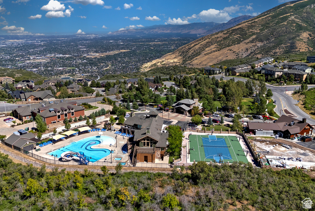 Drone / aerial view featuring a residential view and a mountain view