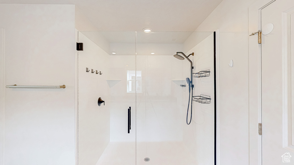 Full bathroom featuring a stall shower