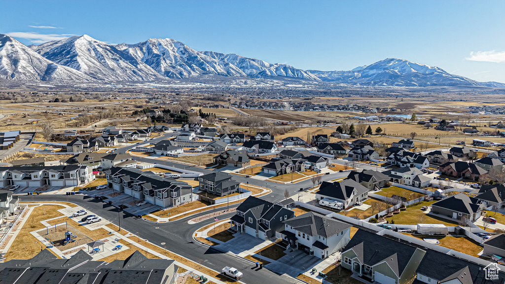 Drone / aerial view with a residential view and a mountain view