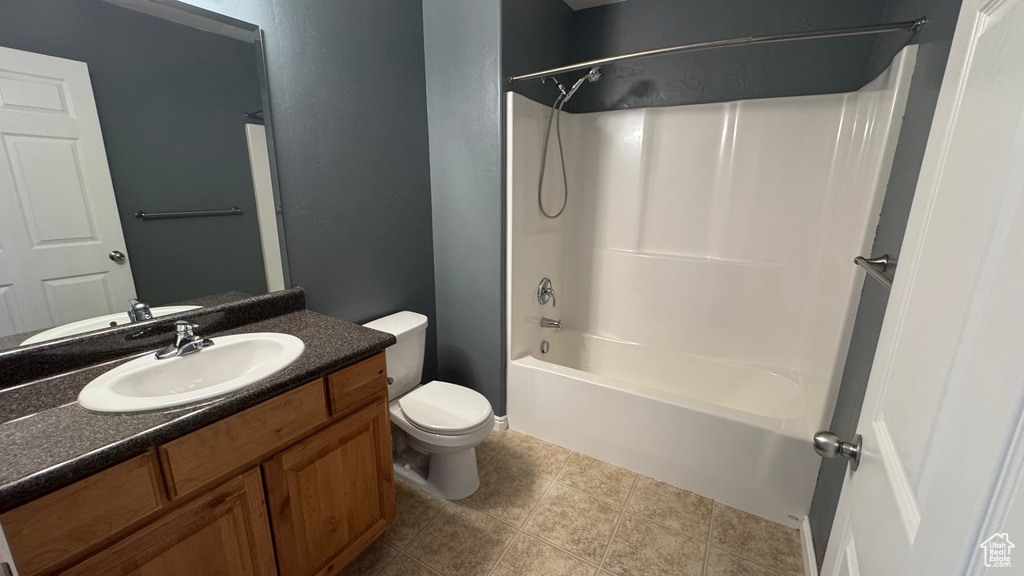 Bathroom featuring vanity and shower / bath combination