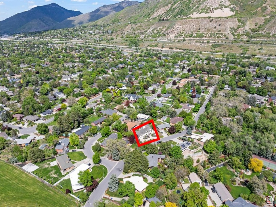 Drone / aerial view featuring a residential view and a mountain view
