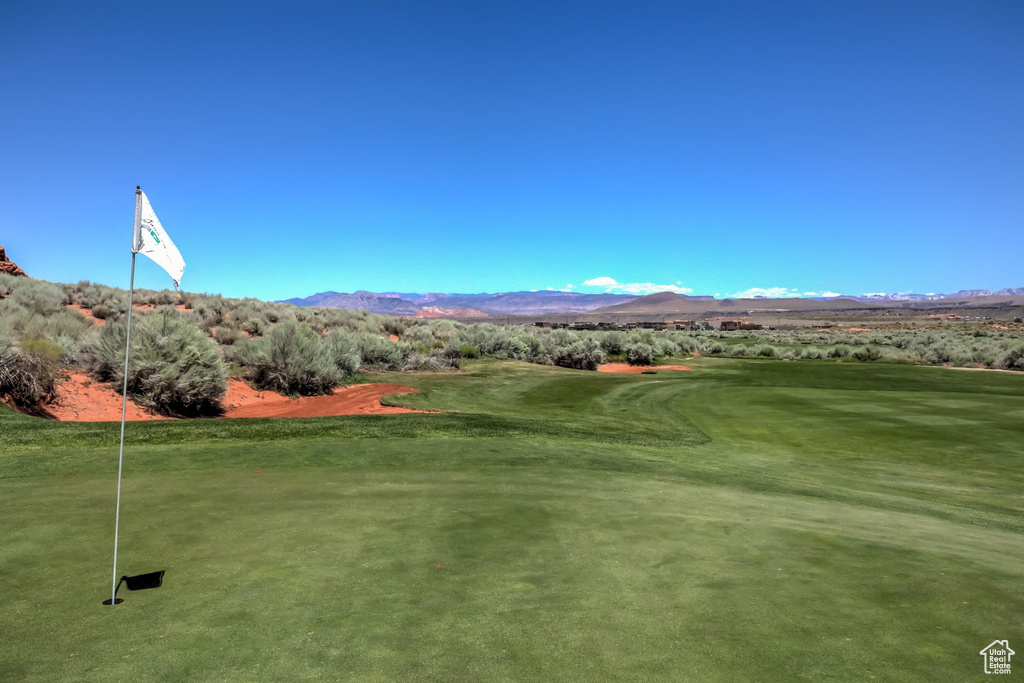 View of property\'s community with view of golf course and a mountain view