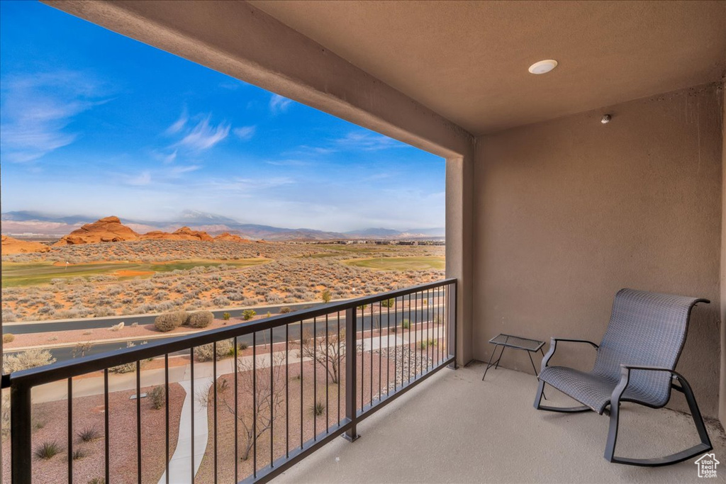 Balcony featuring a mountain view