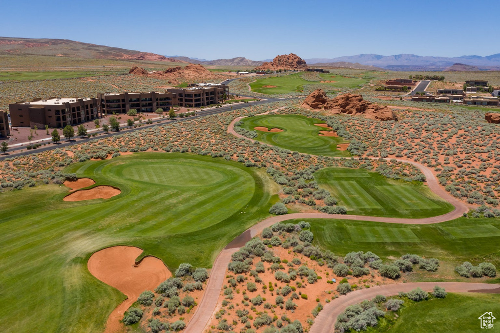 Exterior space featuring view of golf course and a mountain view
