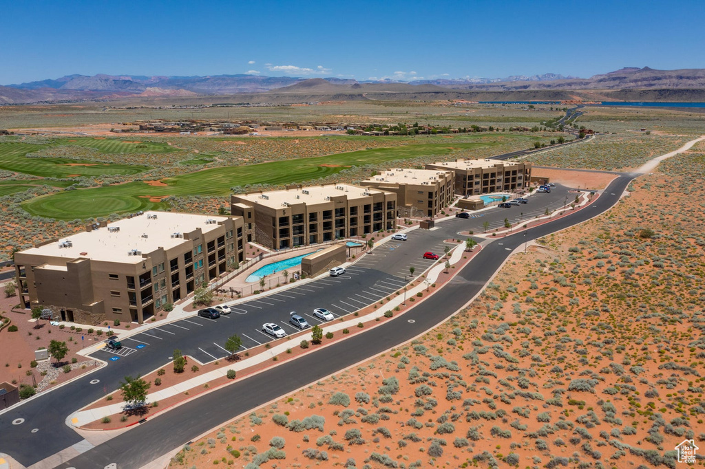 Birds eye view of property with a mountain view