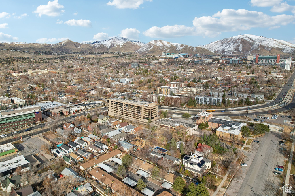 Birds eye view of property with a mountain view