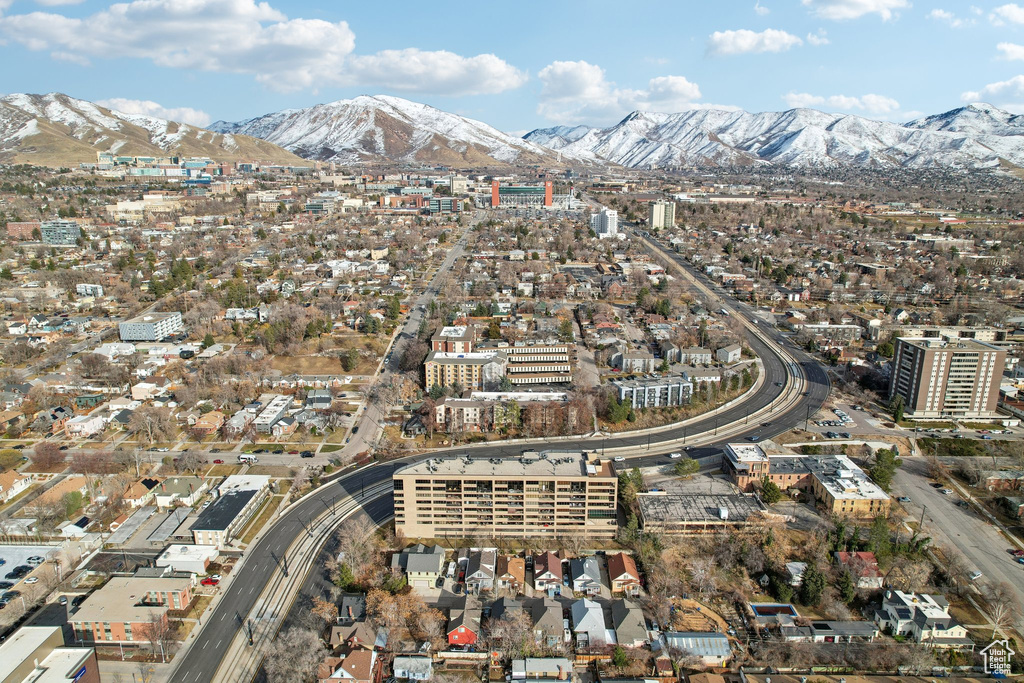 Aerial view with a mountain view and a city view