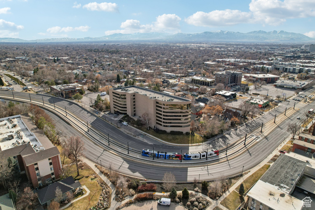 Birds eye view of property with a city view and a mountain view