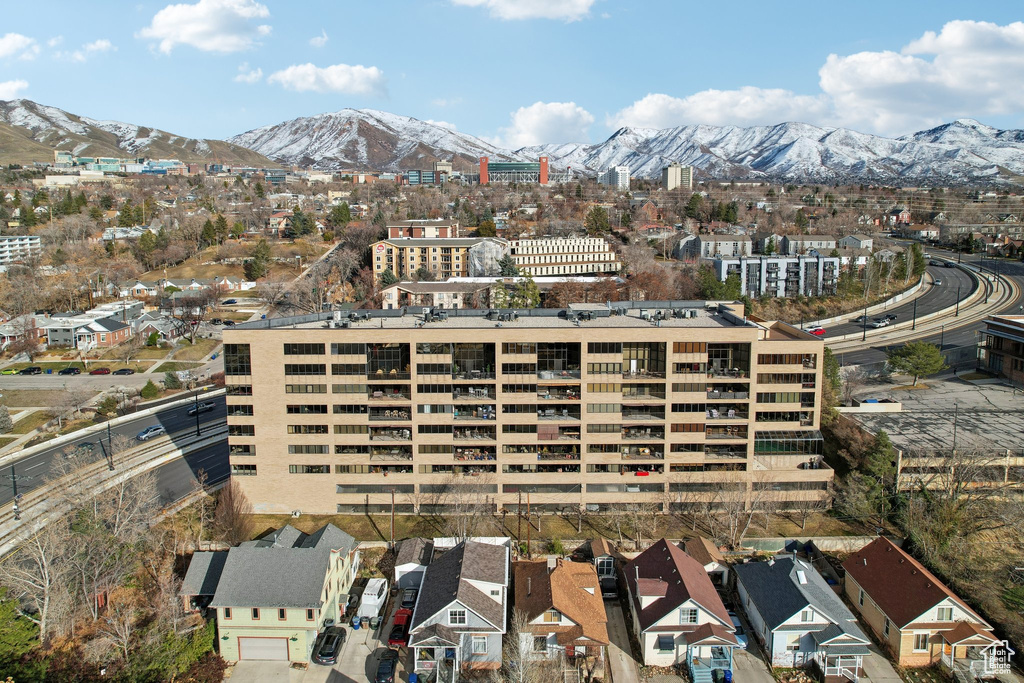 Birds eye view of property with a mountain view