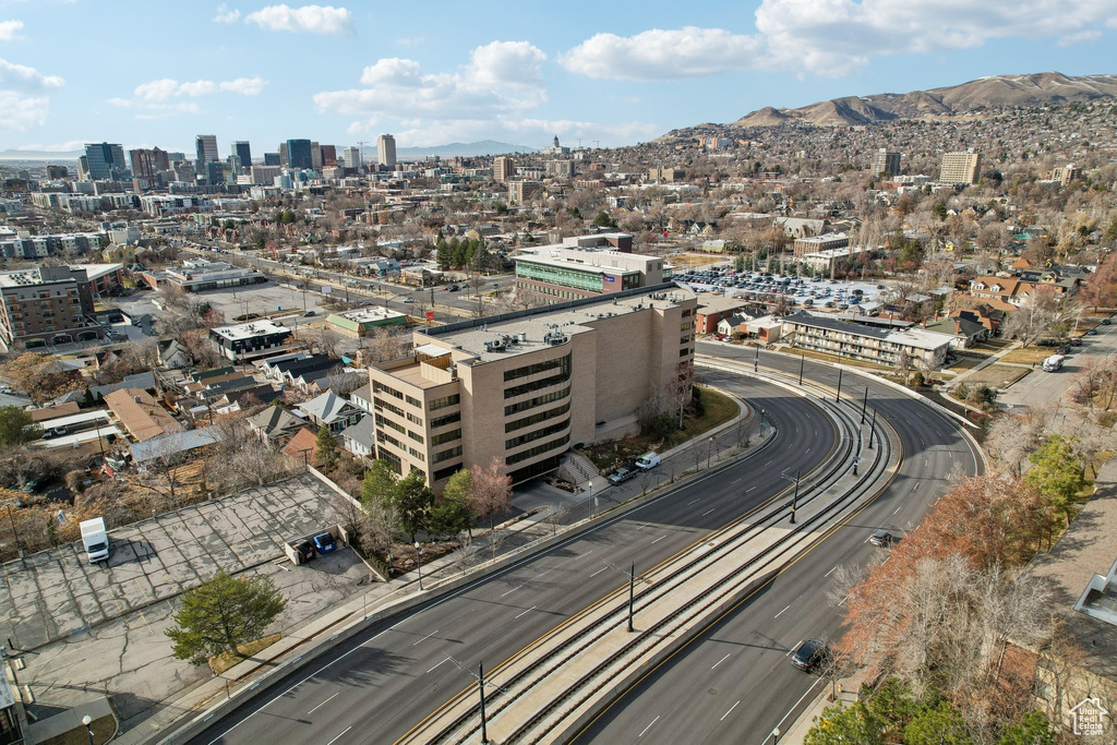 Drone / aerial view featuring a mountain view and a city view