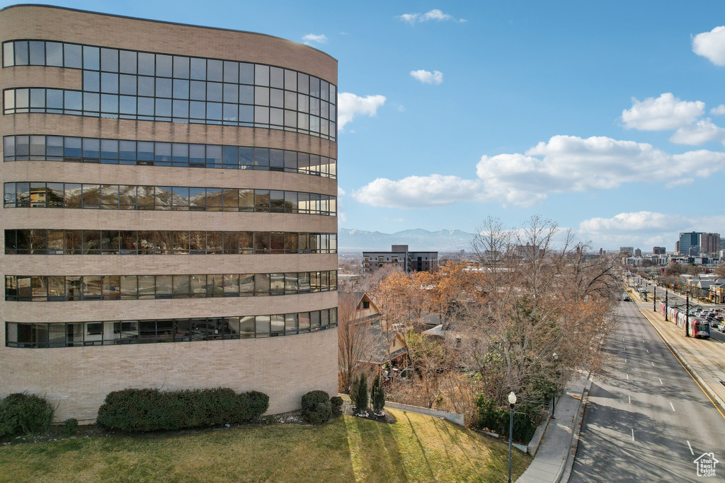 View of building exterior featuring a view of city and a mountain view