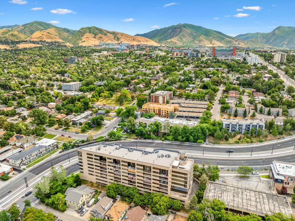 Birds eye view of property with a mountain view