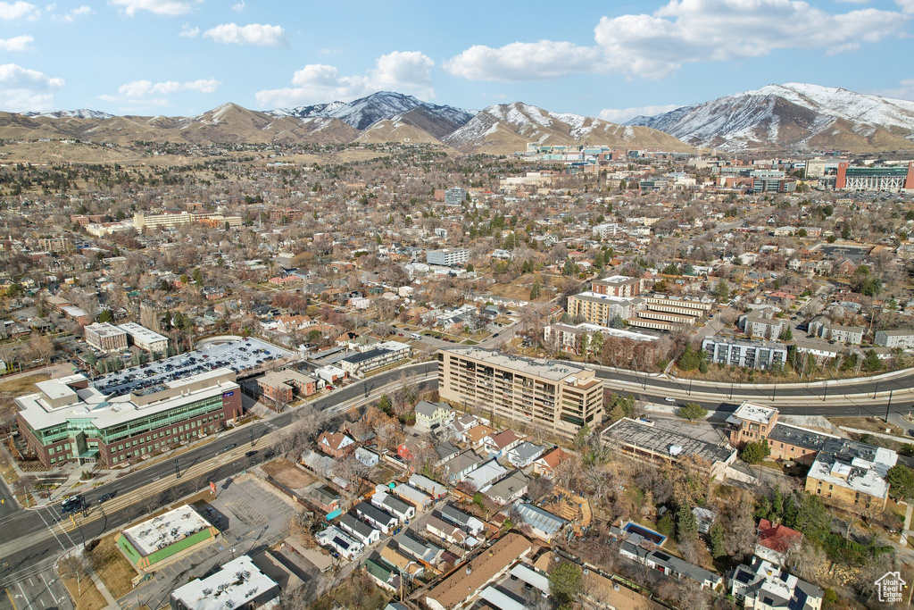 Drone / aerial view with a mountain view and a city view